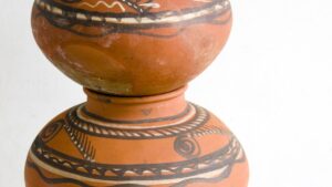 Why does water stay cool in a claypot even in peak summers?